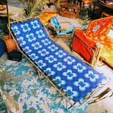 Camp bed or vintage sunbathing