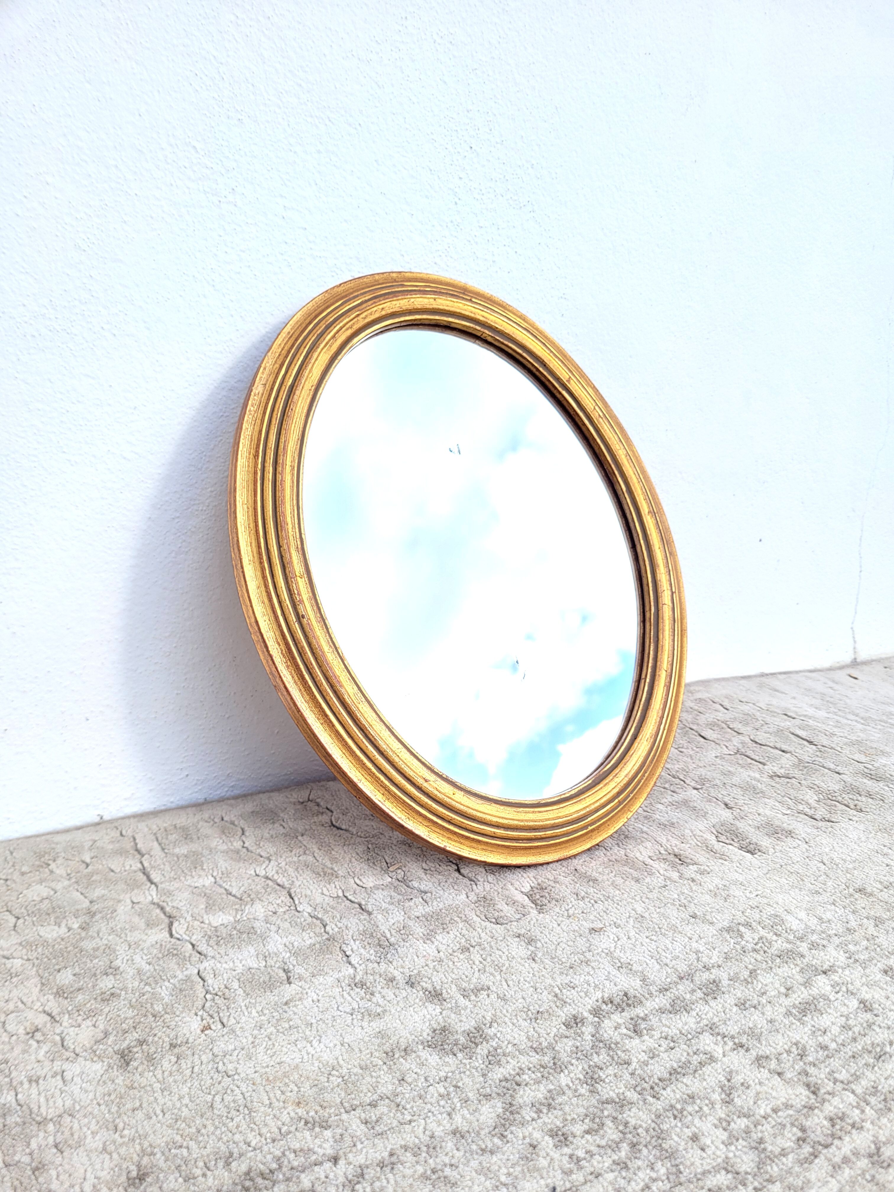 Old oval golden mirror 30x35cm