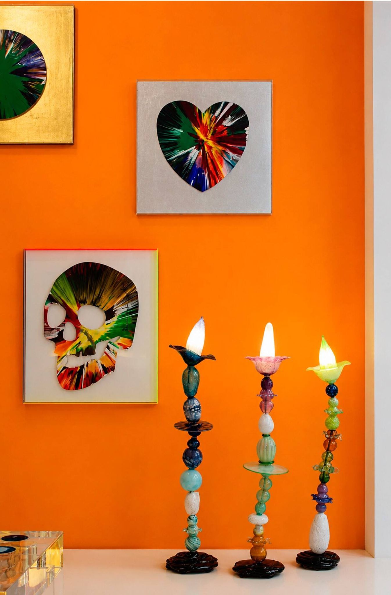 Set of three sculptural multicoloured glass floor lamps in a modernist style.