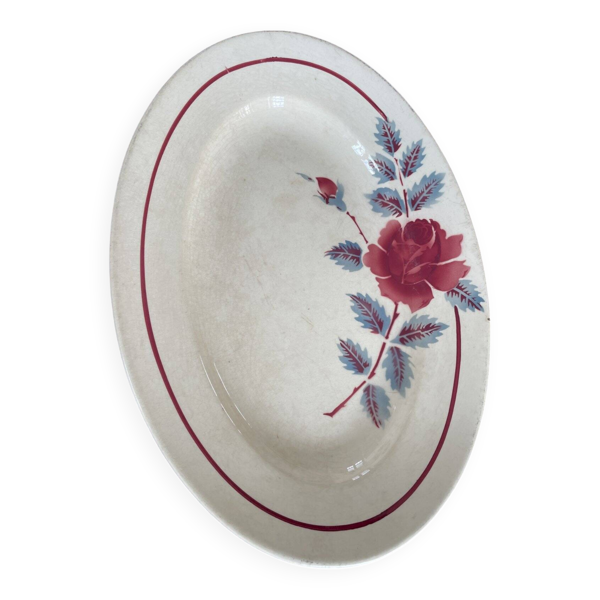 Oval plate Moulin des Loups in blue and red ceramic with a floral design.