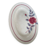 Oval plate Moulin des Loups in blue and red ceramic with a floral design.