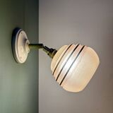 Vintage globe wall light in frosted pink and gold glass.