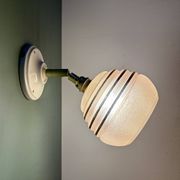 Vintage globe wall light in frosted pink and gold glass.
