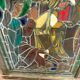Stained glass panel representing a nineteenth century coronation