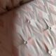 Small vintage 2-seater sofa from the 70s in Hollywood Regency style, satin pink.