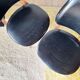Paire de chaises vintage 1960 – Pieds compas & Simili-cuir noir