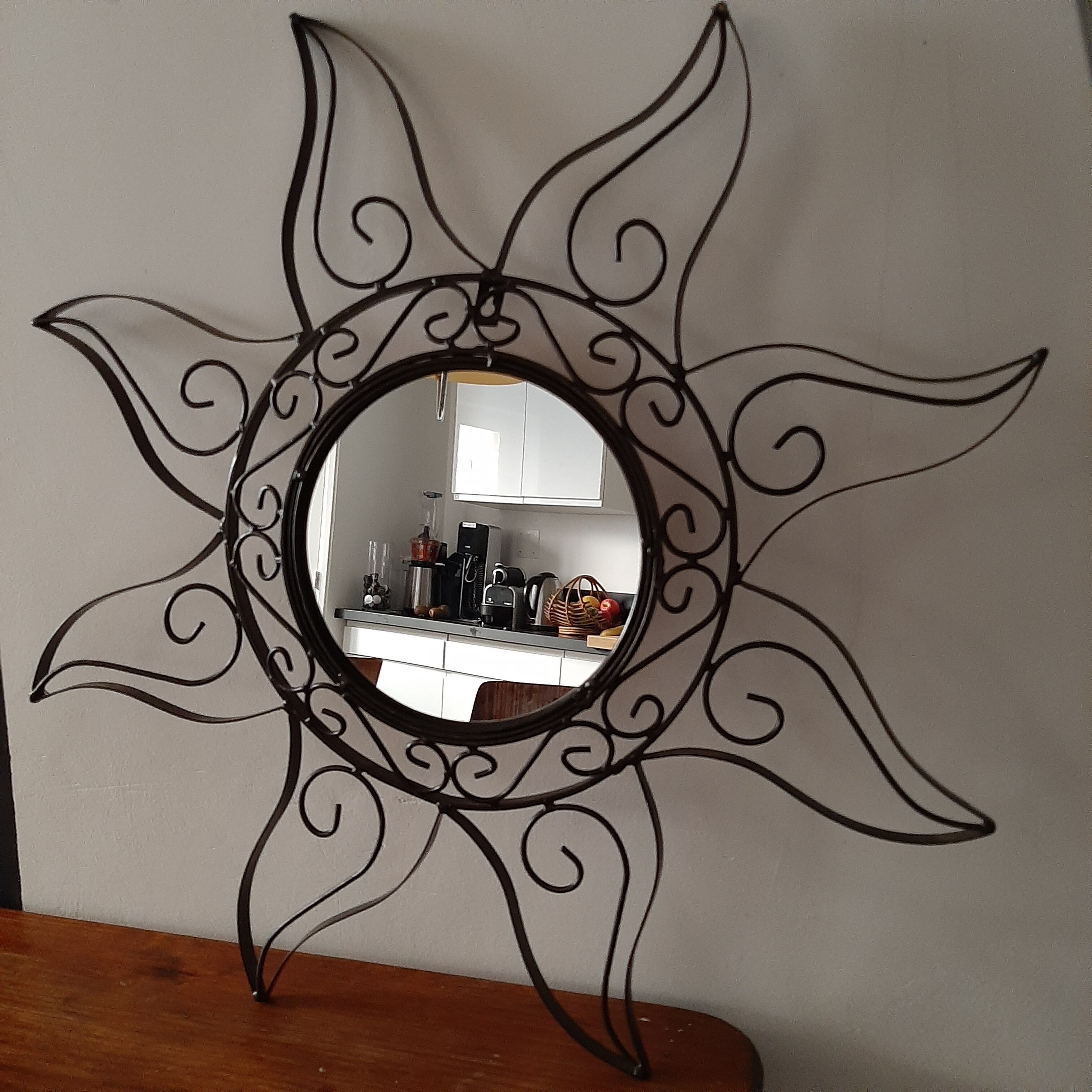 Wrought iron sun mirror