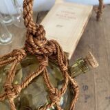 Glass and rope hanging vase