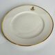 Service d’assiettes à bord doré, monogrammées | E. Bourgeois | Fin XIX