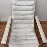 Pulkka armchair by Ilmaria Lappalainen and its ottoman