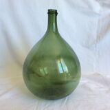 Former "lady jeanne" in blown glass, green bottle