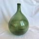 Ancienne “dame jeanne” en verre soufflé,vert bouteille