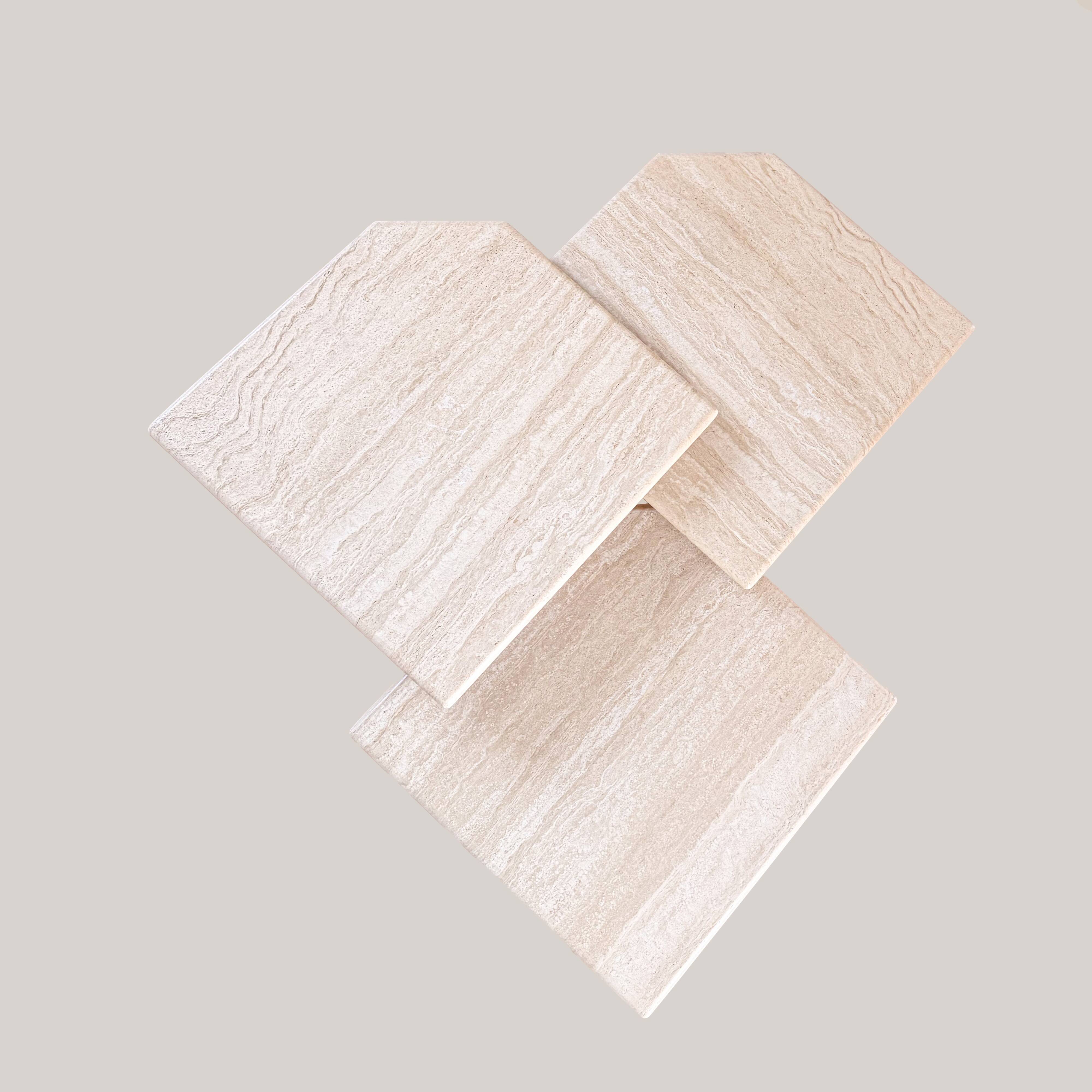 Travertine nesting tables, Italy, 1970s.