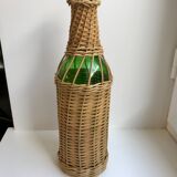 bottle surrounded by rattan 70s