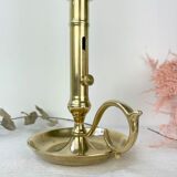 Brass candle holder with pusher late nineteenth century