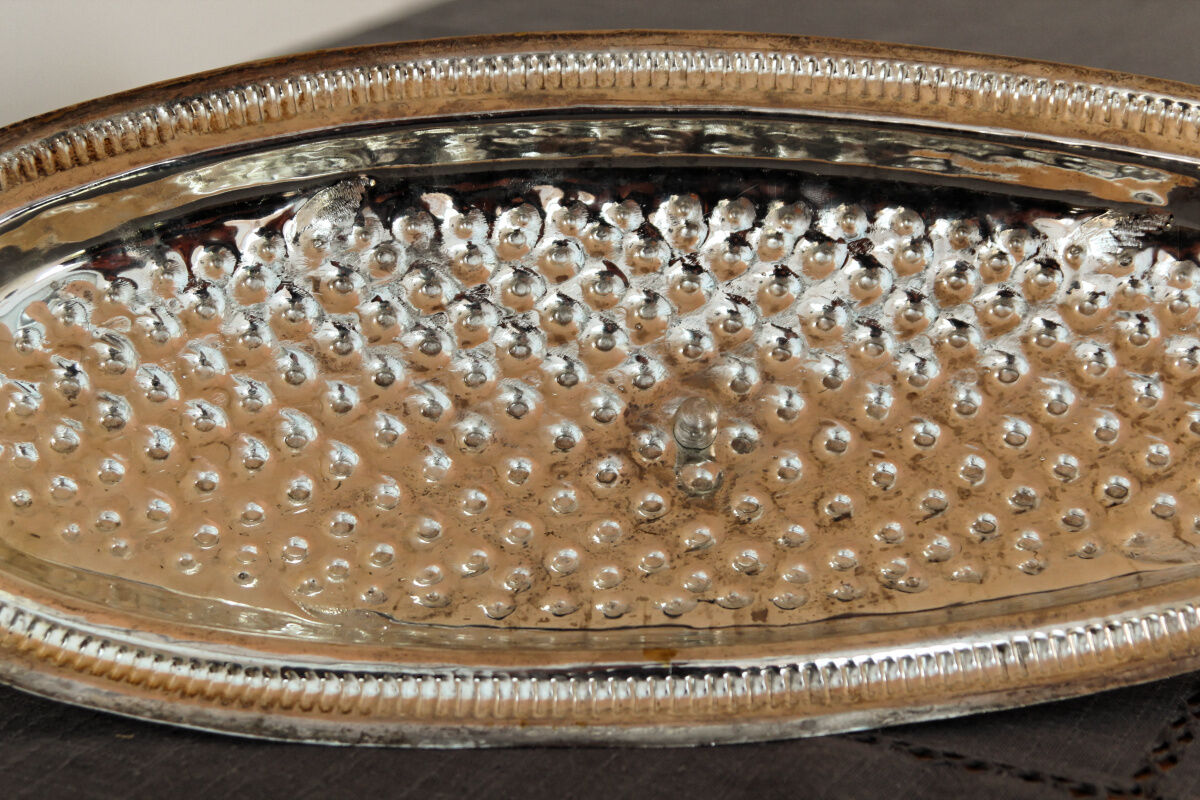 Ancient fish dish in silver metal