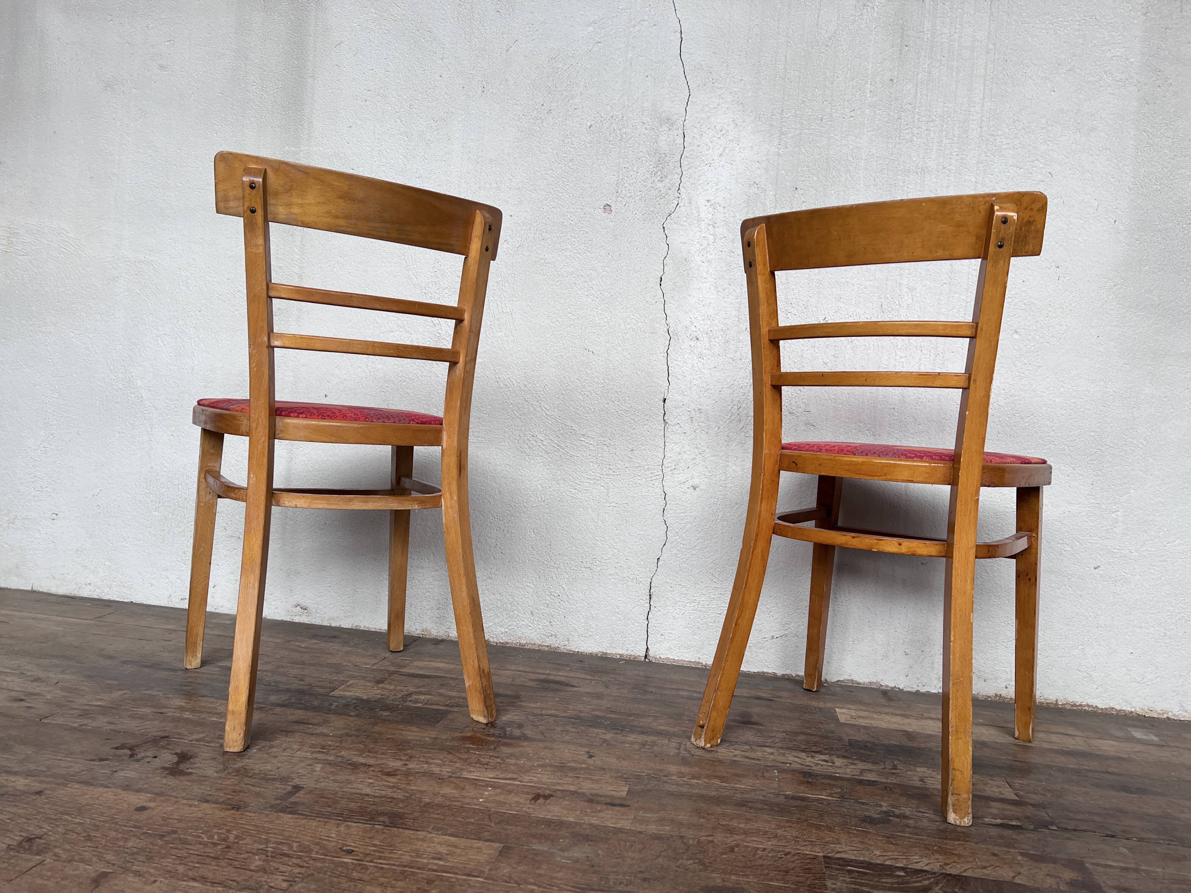 Pair of chairs in light wood and vintage red fabric 1960