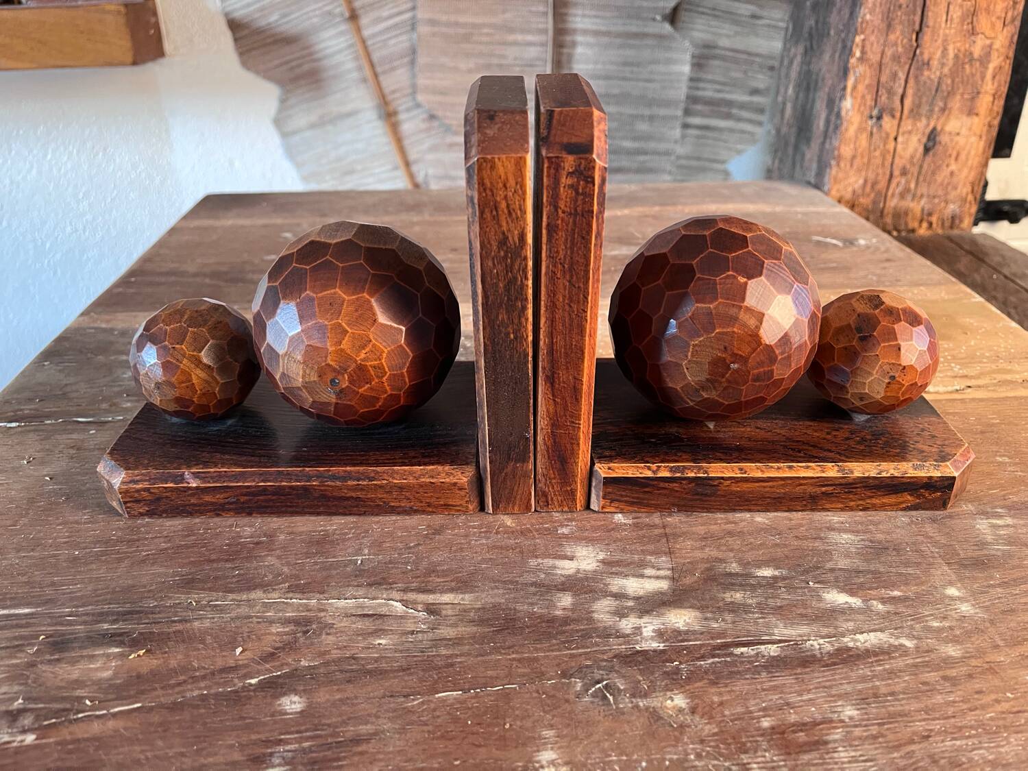 Pair of carved wooden bookends