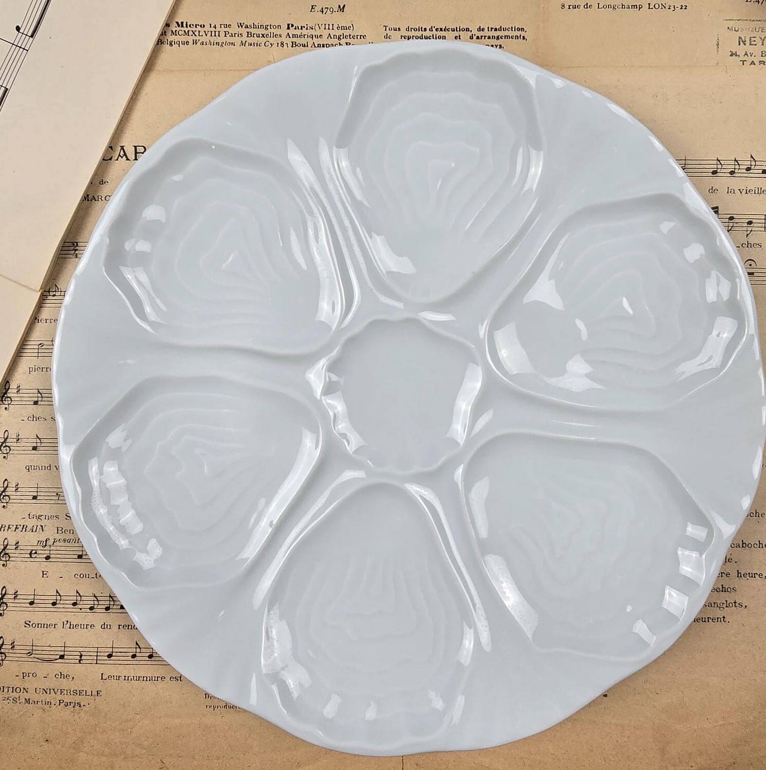 Set of 4 vintage Limoges porcelain oyster plates from France