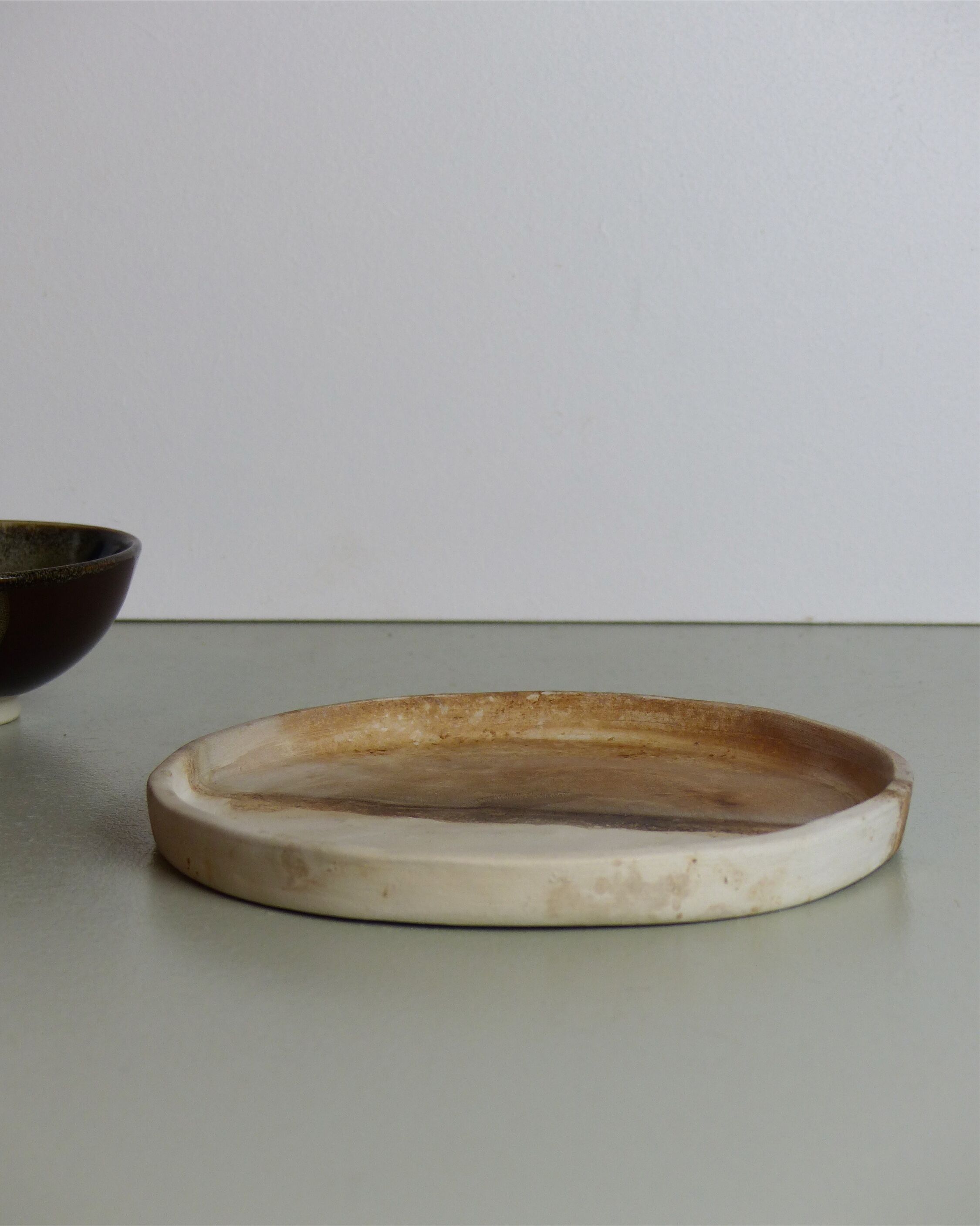 Beige tidy or centerpiece