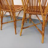 Set of 4 vintage Audoux Minet rattan chairs from the 1950s and 60s.