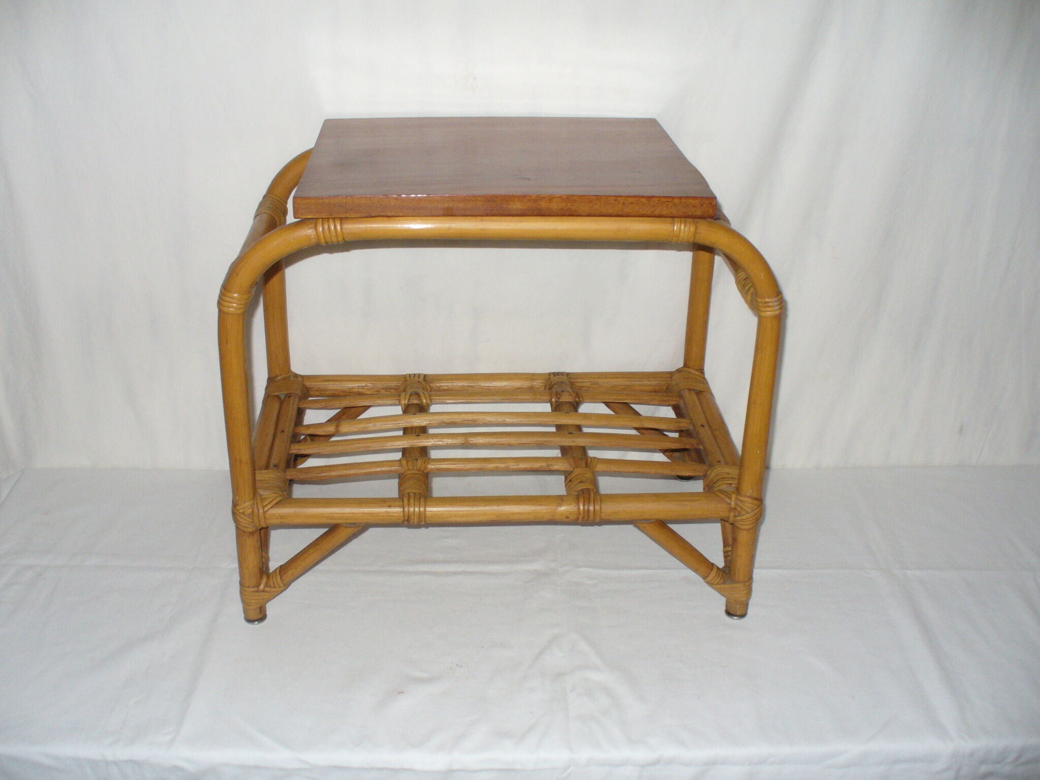 Rattan top bedside table from the 1950s