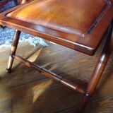 Leather folding armchair and footwork