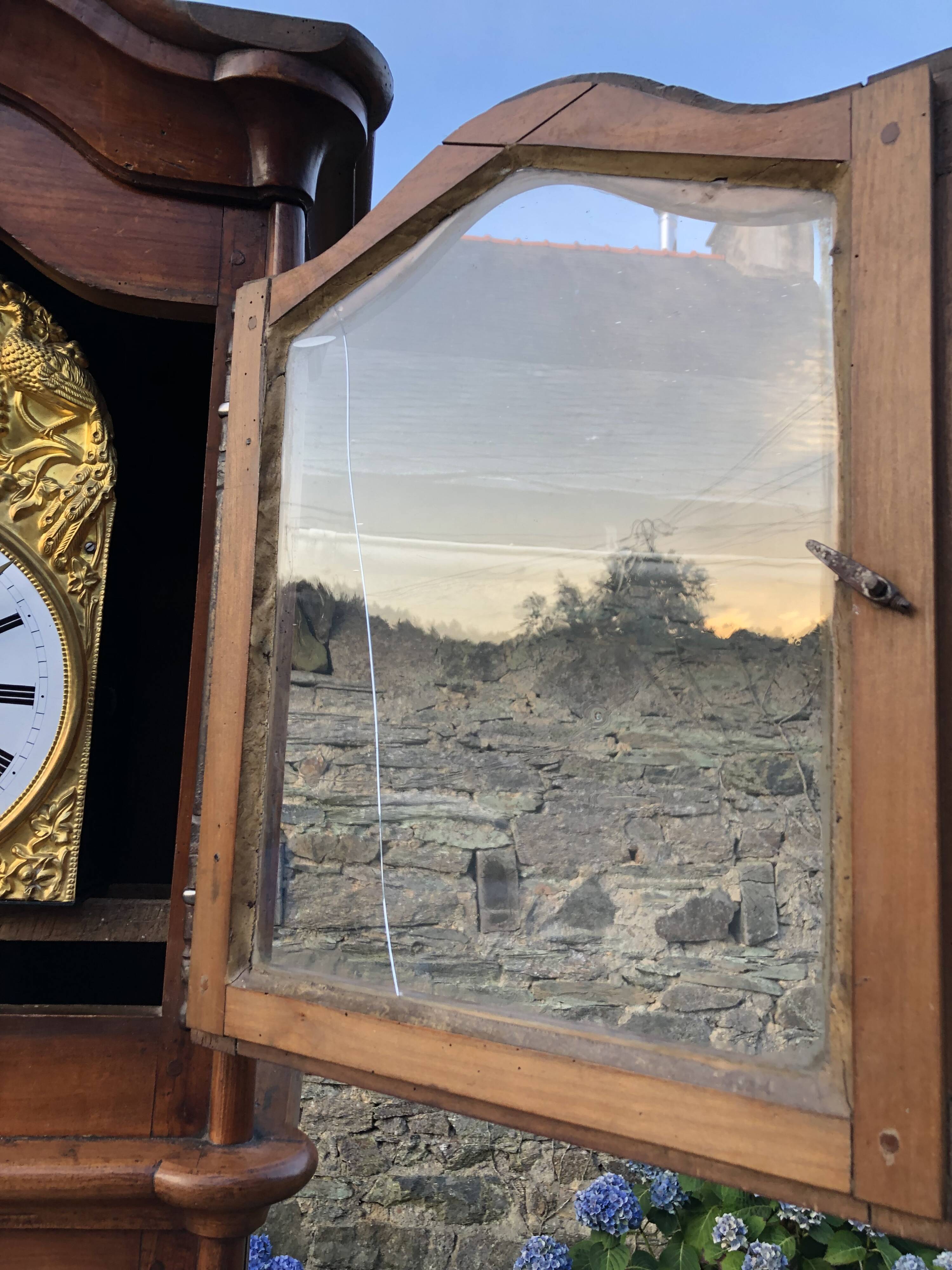 Comtoise clock in cherry style Louis XV period 19th region Fougères.