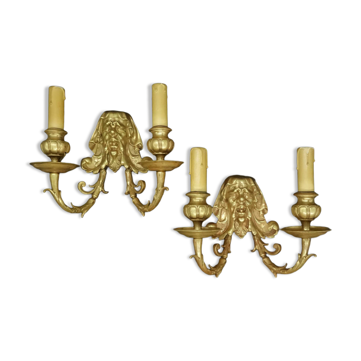 Pair of wall sconces with grotesque heads in 19th-century Renaissance style - bronze