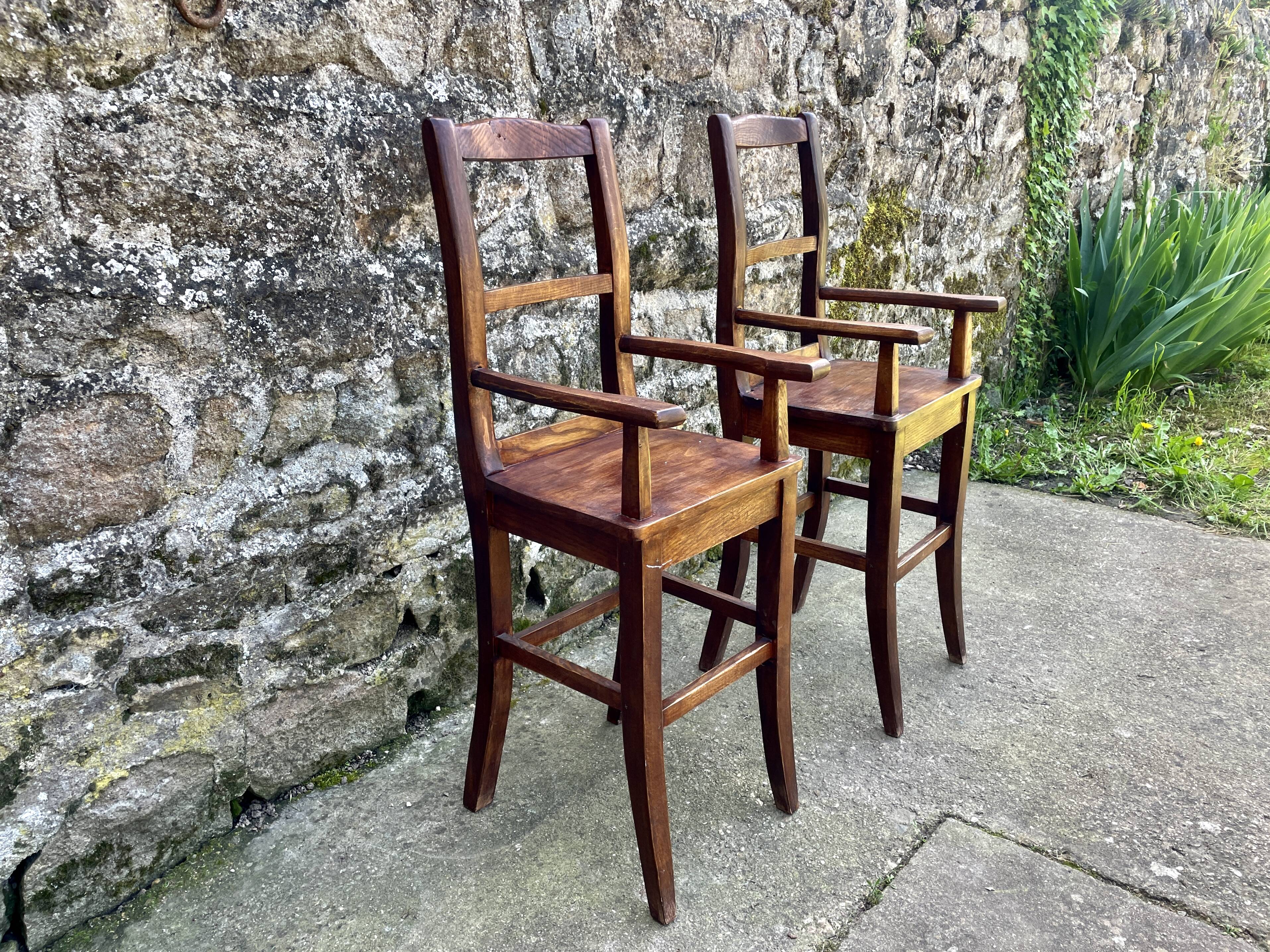 Pair of children's high chairs, early 20th century craftsmanship.