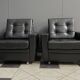 2 Black leather arm chairs 1960s on wheels