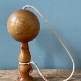 Old bilboquet in varnished wood