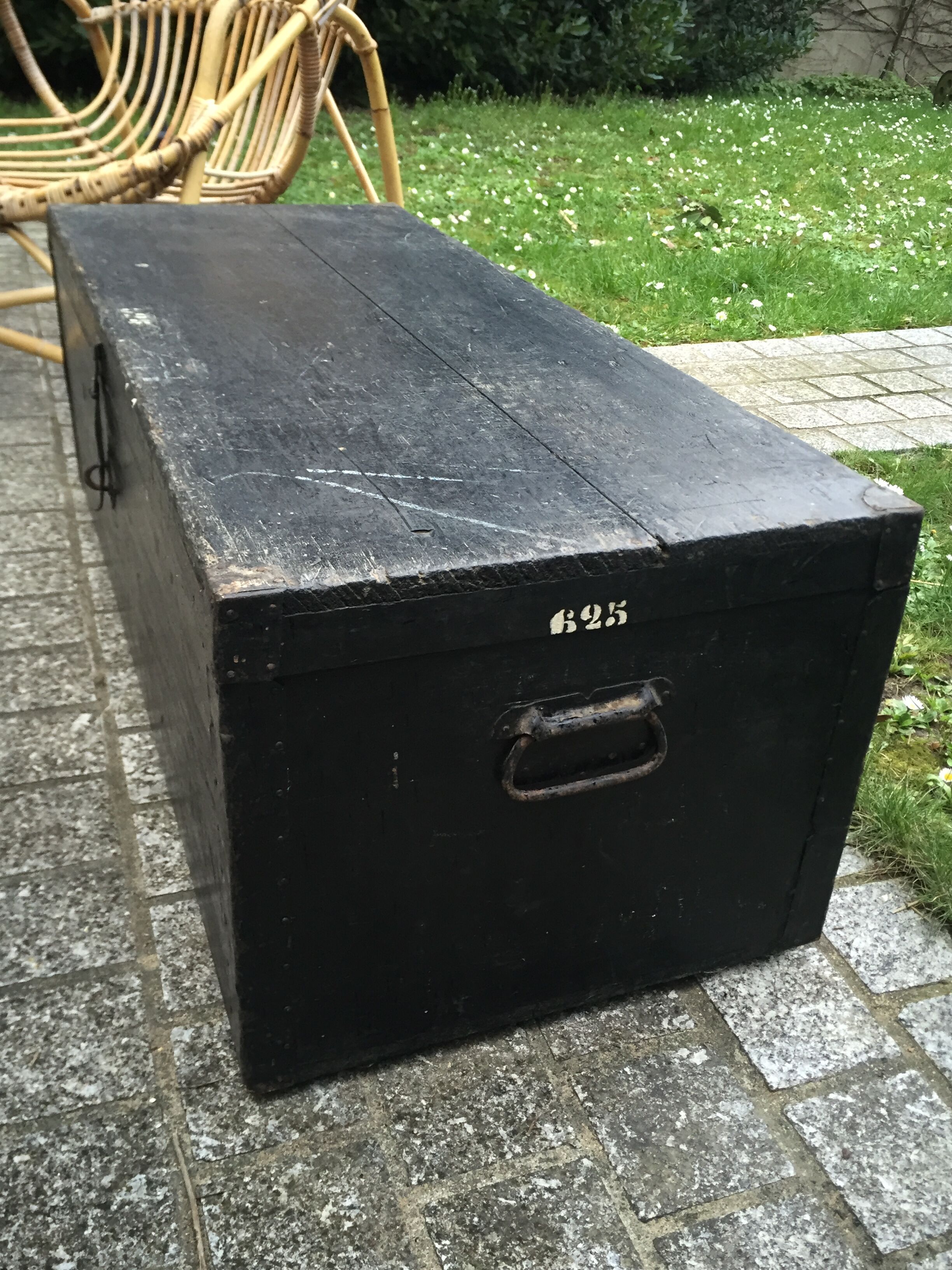 Old chest or wooden trunk black patina