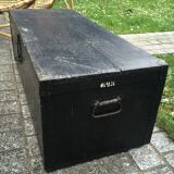 Old chest or wooden trunk black patina