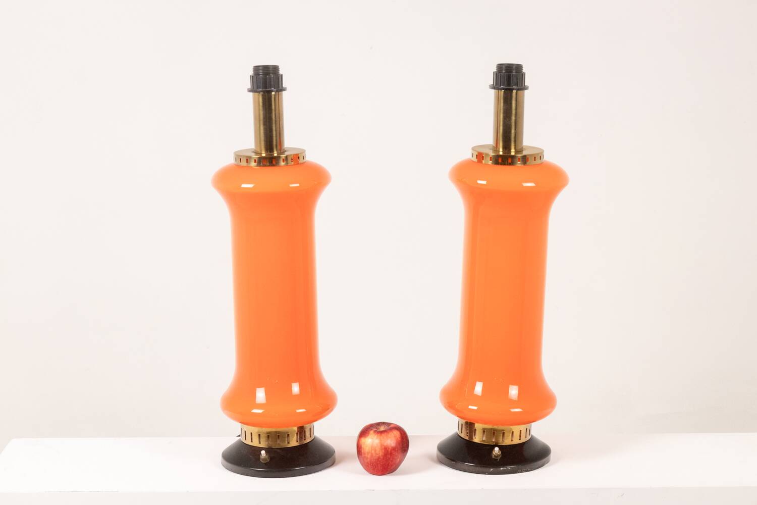 Pair of orange glass lamps. 1970s.
