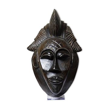 Decorative African wall mask in Punu Tsangui style, carved wood, 20th century.