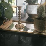 Twisted candlestick in gold metal