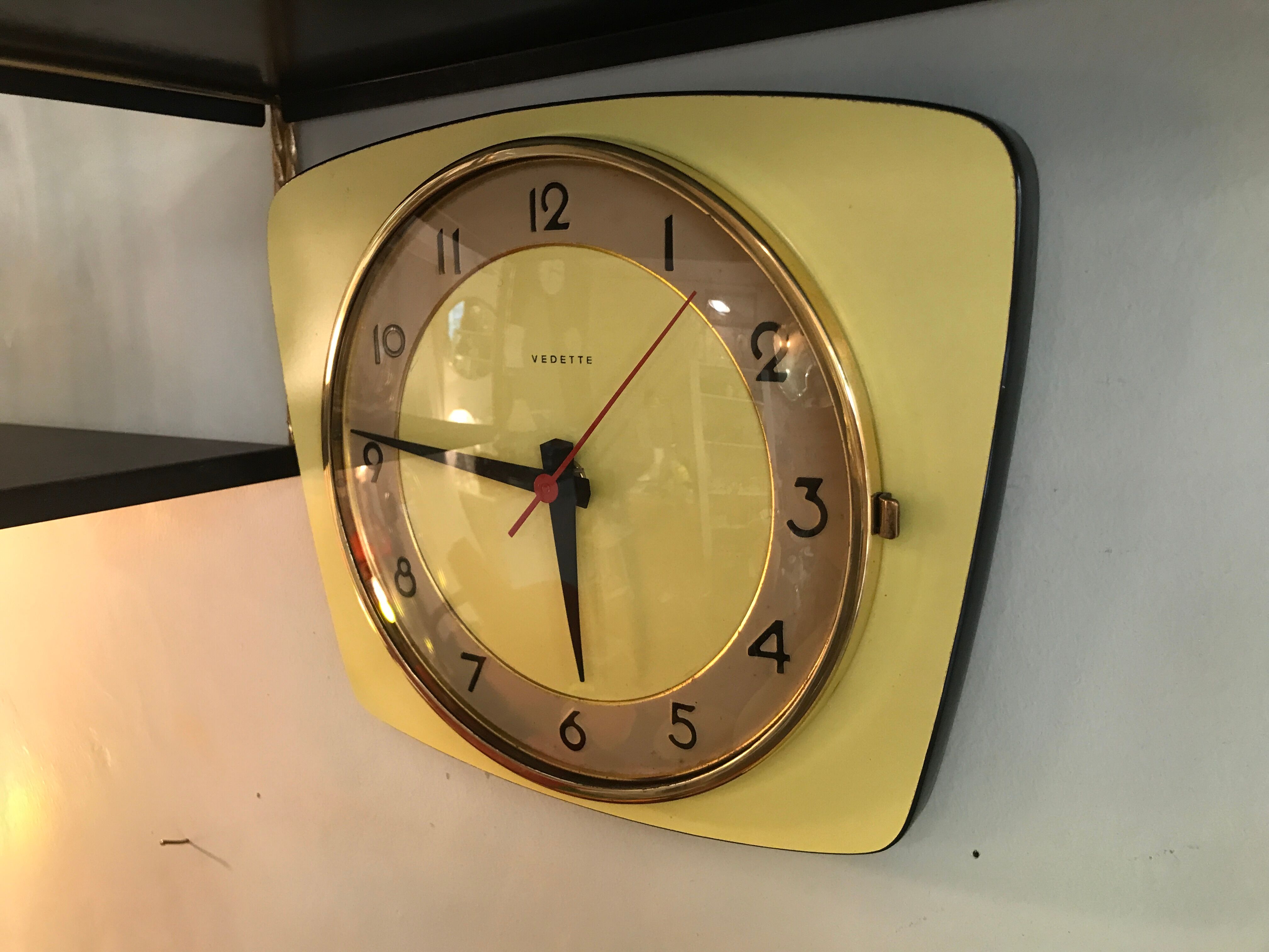 Vintage clock star Formica yellow wall pendulum