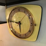 Vintage clock star Formica yellow wall pendulum