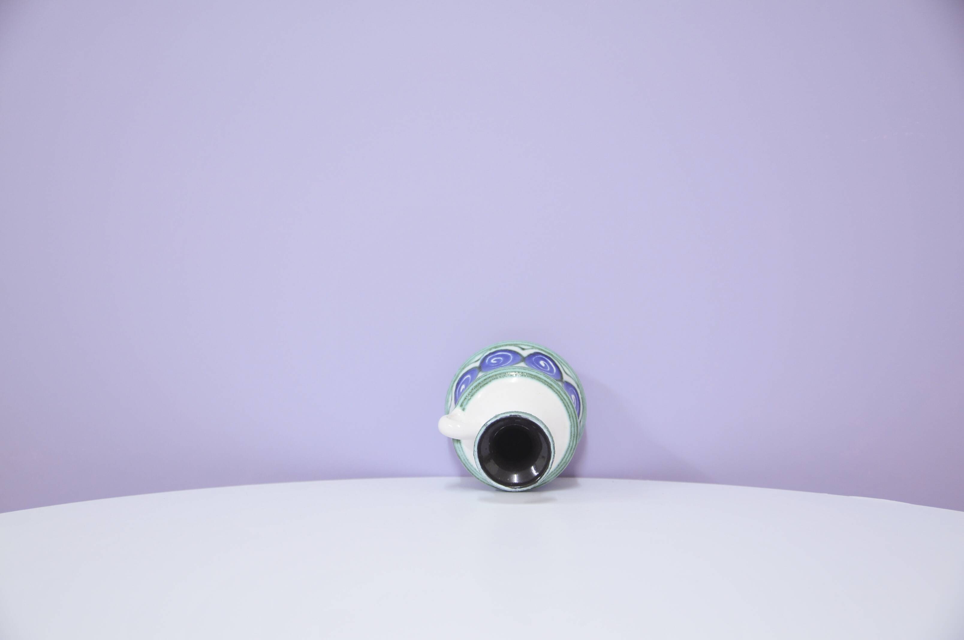 vintage white vase painted blue