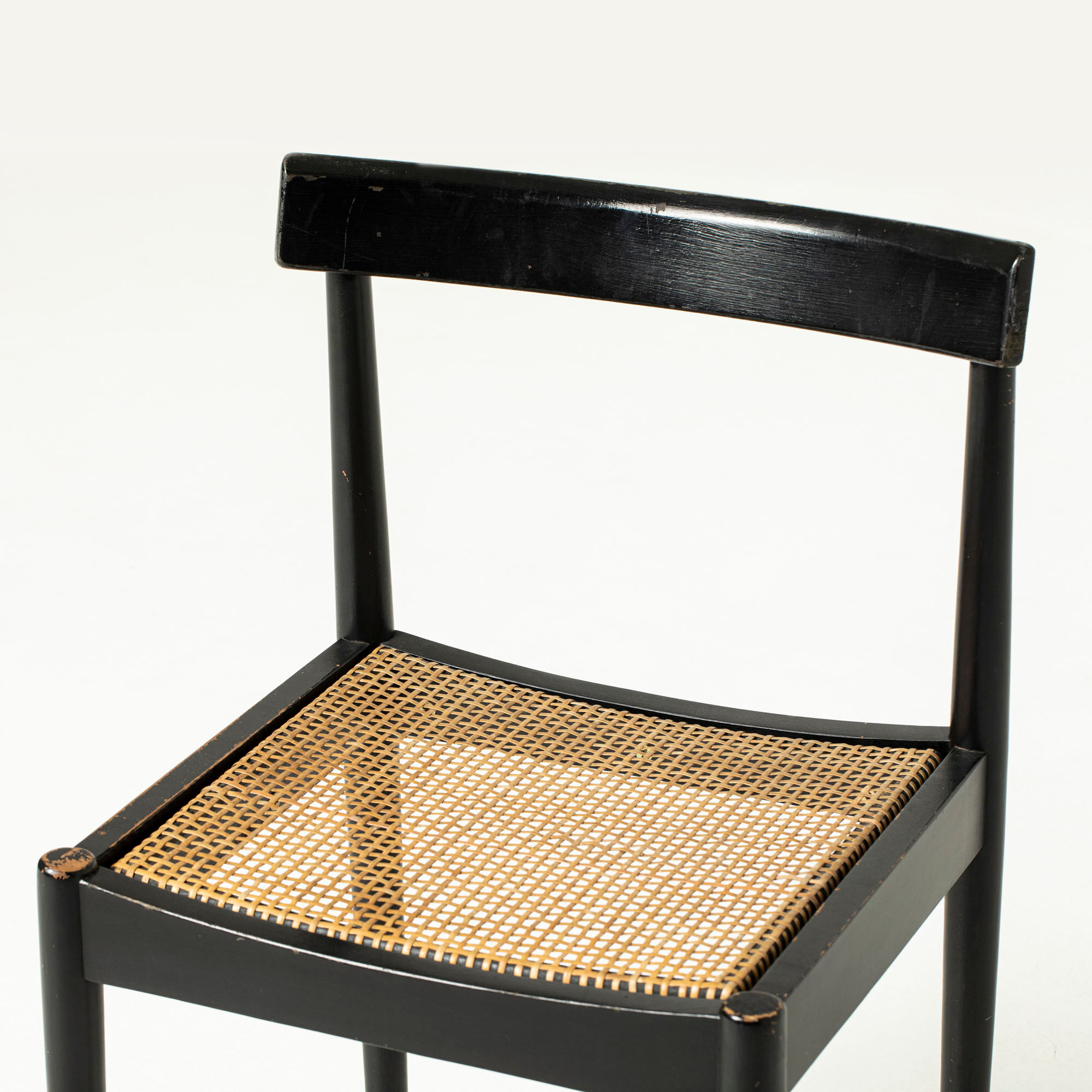 Mid-century dining chair in black laquered wood and cane