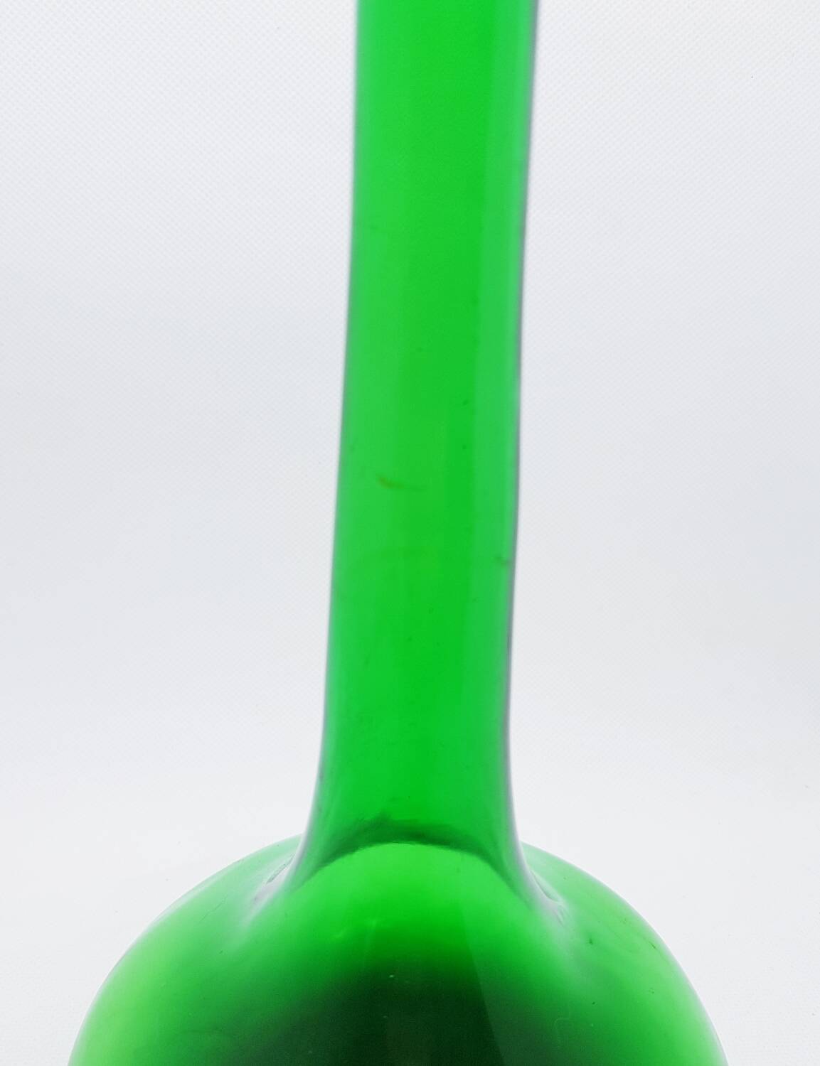 Tall green glass bud vase