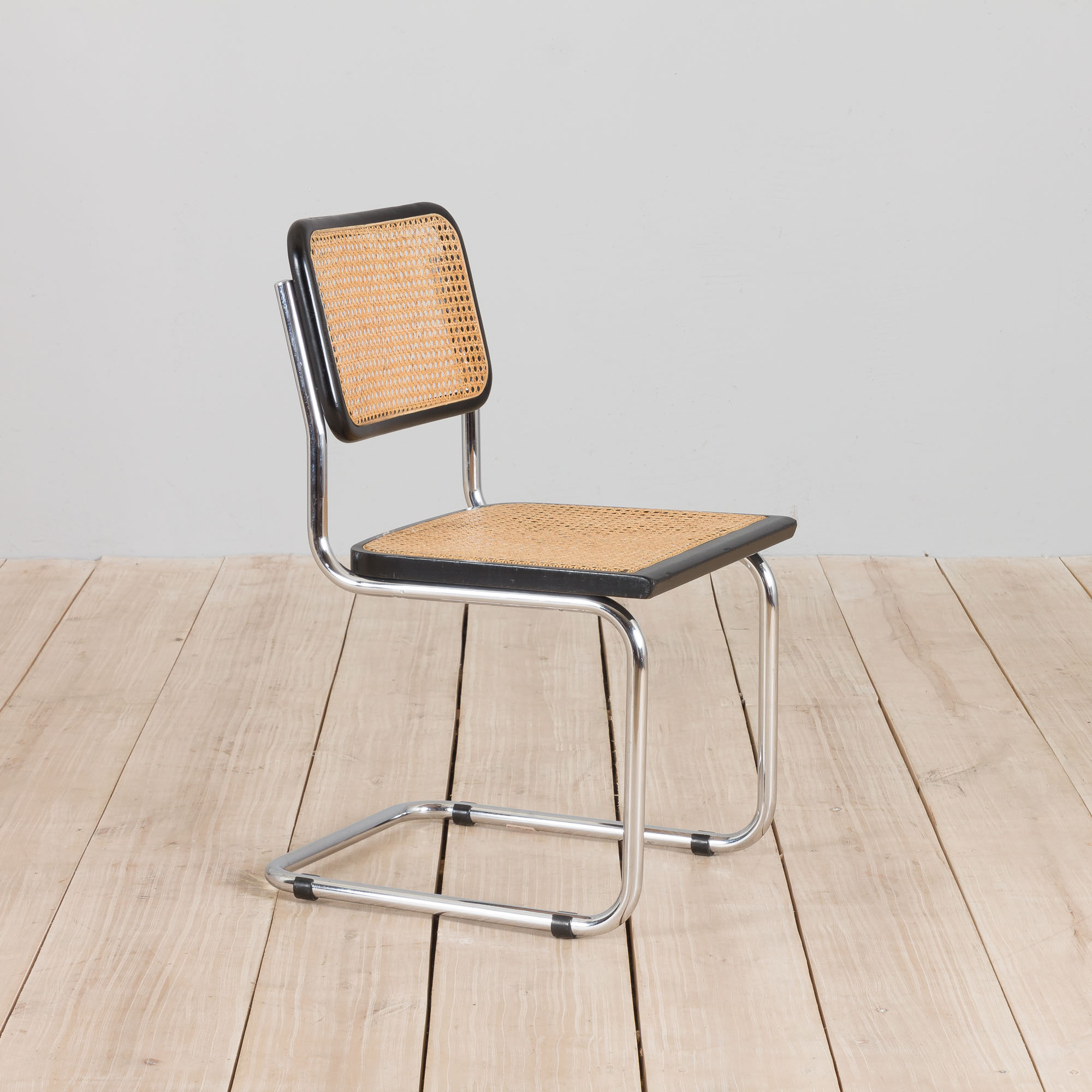 Black cesca chair by Marcel Breuer