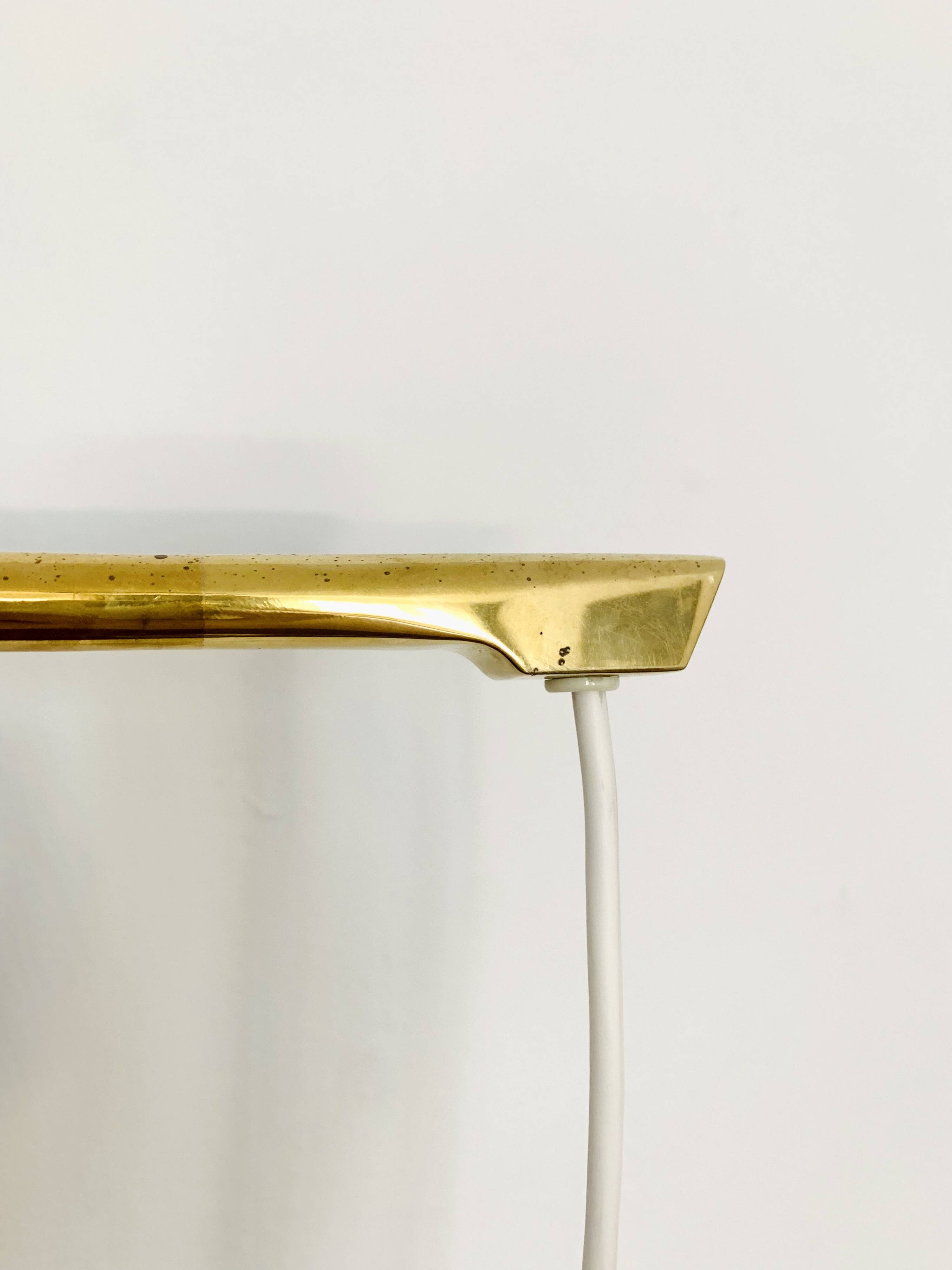 Adjustable Brass and Wicker Arc Sconce
