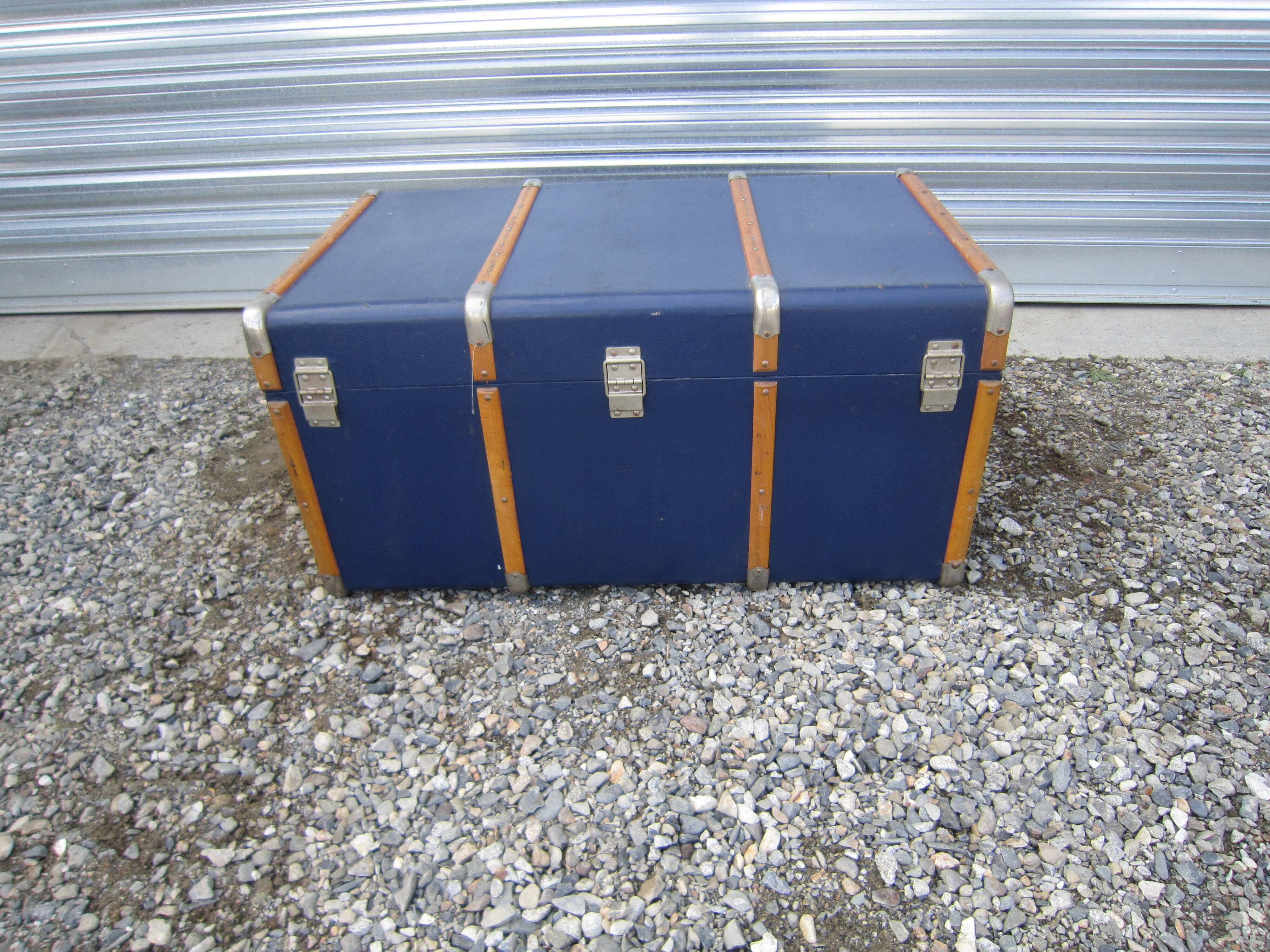 Old blue travel trunk handle leather