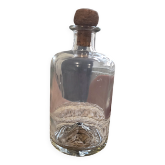 Glass vial with its small cork stopper