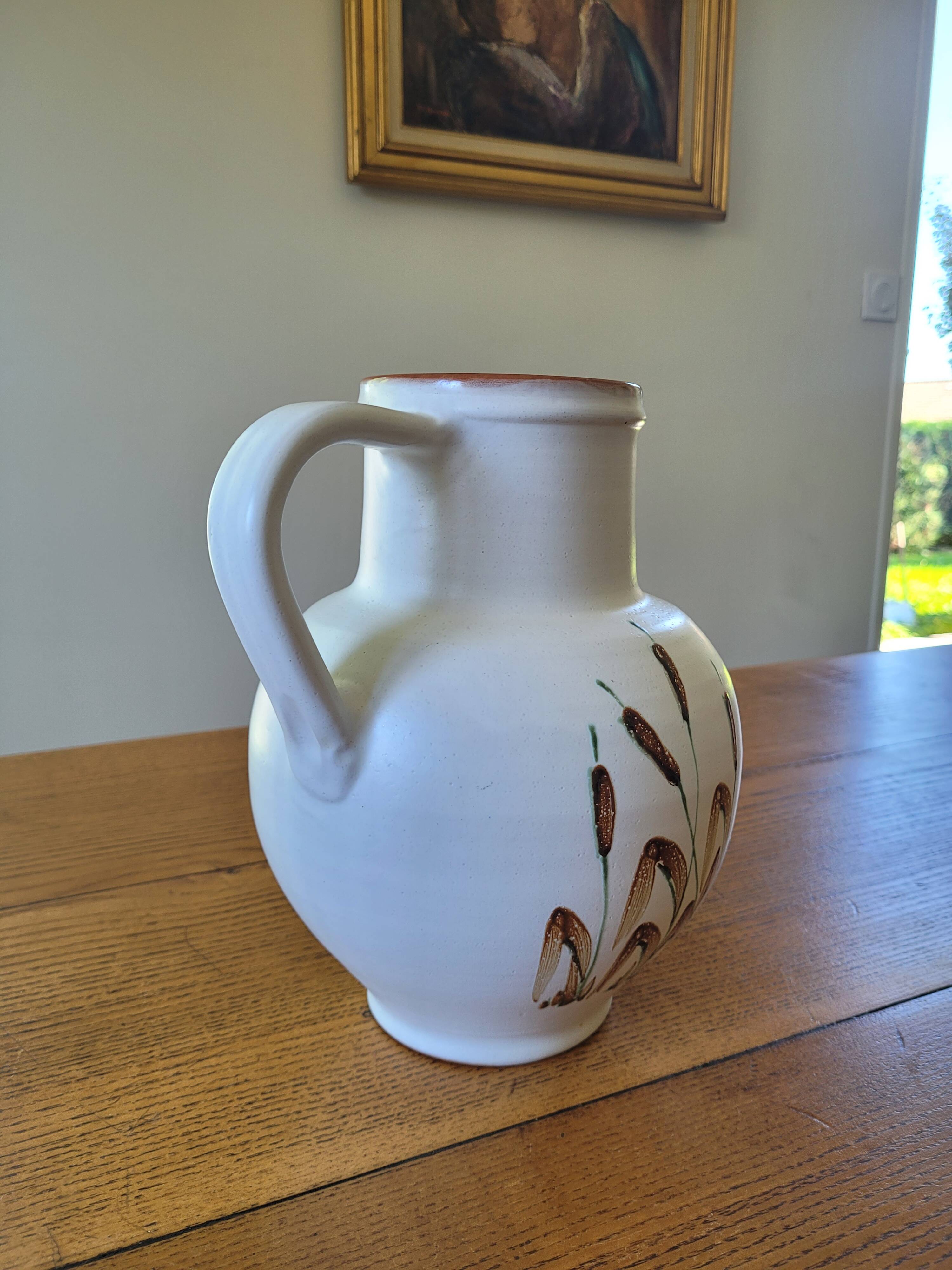 XL ceramic pitcher signed