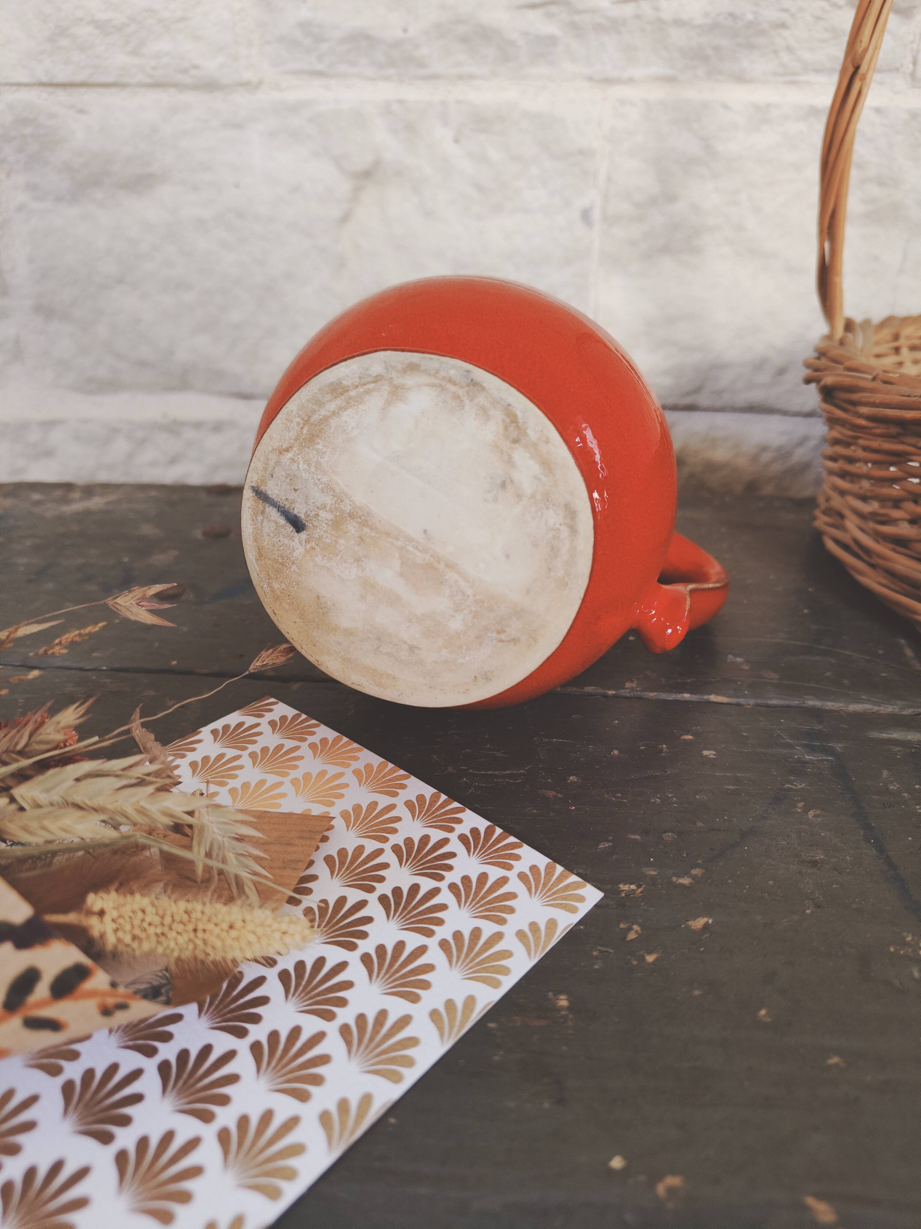 Small red enameled ceramic pitcher Emile Henry