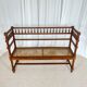 Antique banquette in Louis XIII style, turned wood with caning, late 19th to early 20th century.