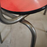 TABLE with two Italian EXTENSIONS and its 6 vintage CHAIRS of the 1970s in red color